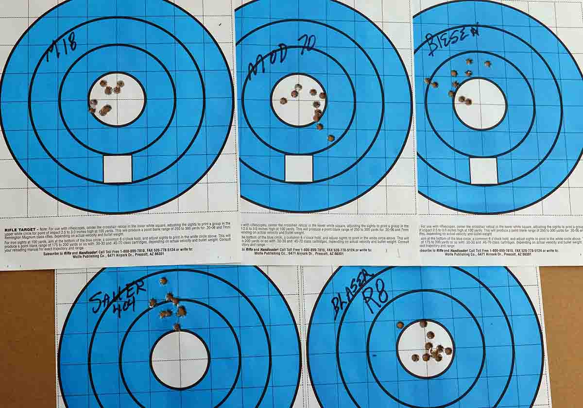 The best 10-shot group (upper left) was fired from the Mauser M18 (1.29 inches). The second-best group (bottom left) was shot with the Sauer 404 (1.59 inches). The Blaser R8 was right in there, were it not for one flyer, while the Model 70 had two flyers.